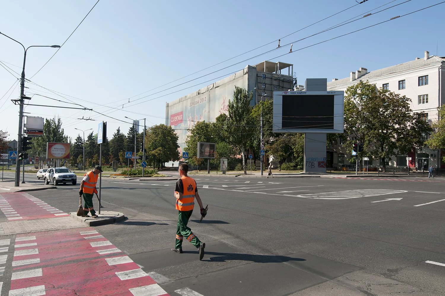 City workers keeping the streets neat 