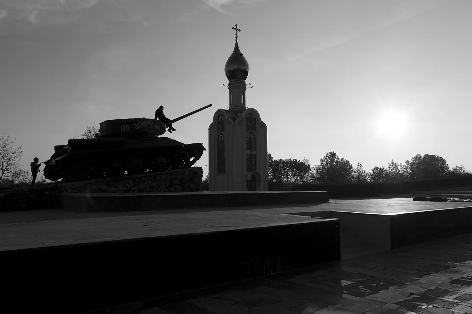 Kids playing on a T-34, memorial for World War Two.