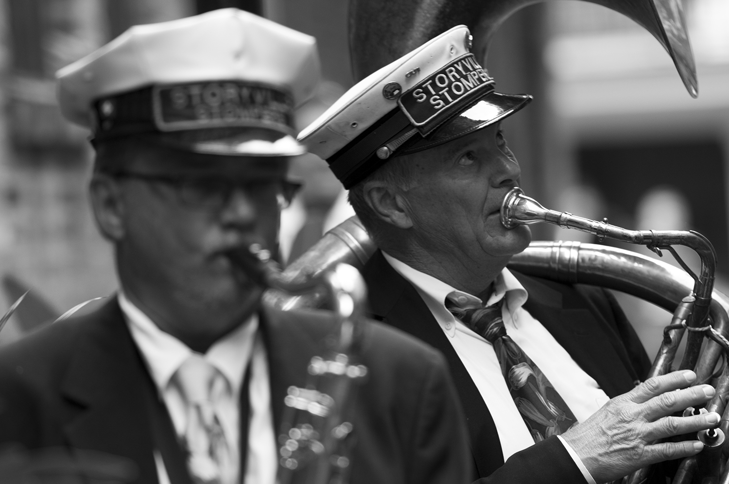 Storyville Stompers brass band marching down the streets of the French Quarter.