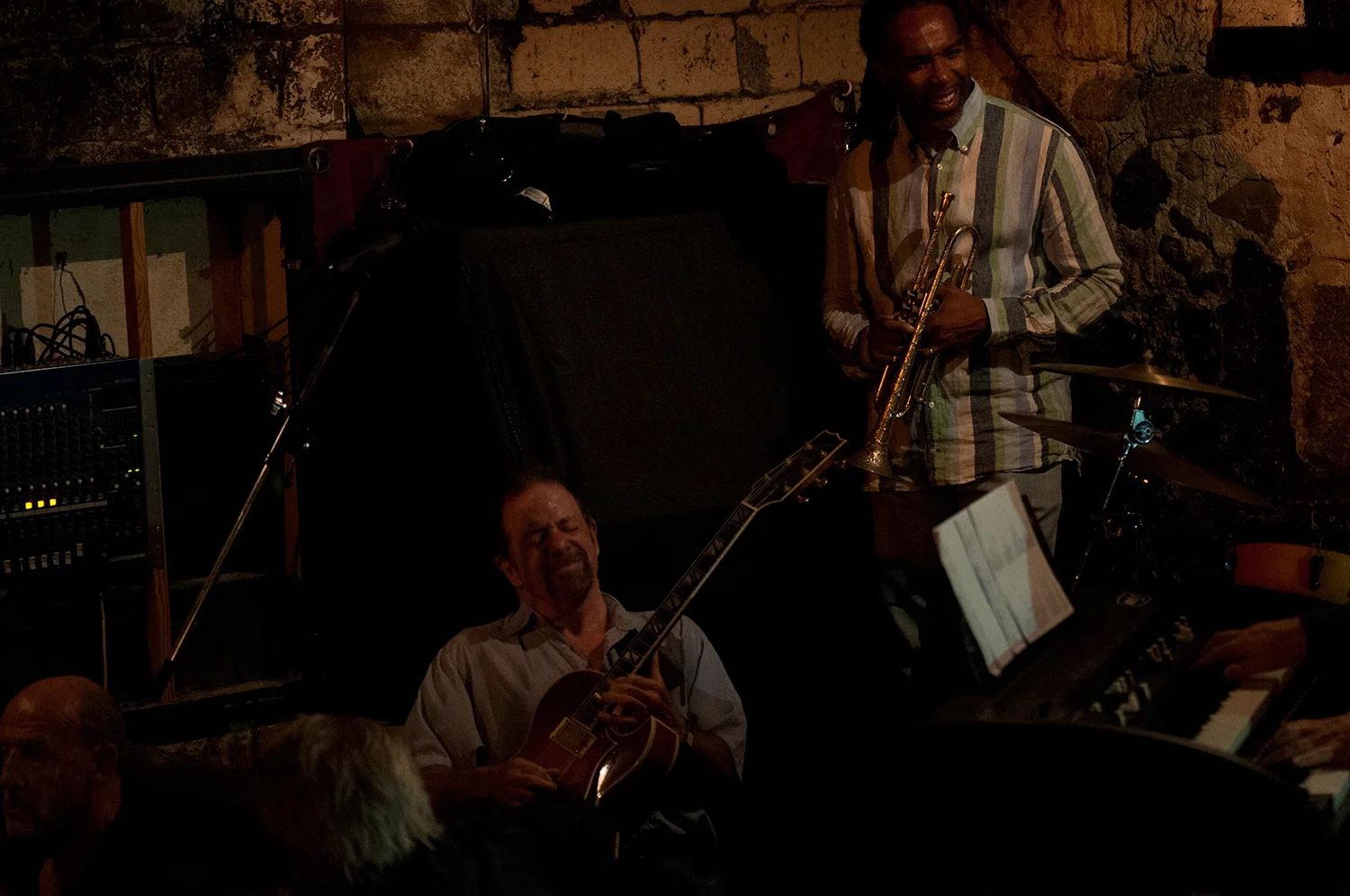 Musicians jamming on the stage.