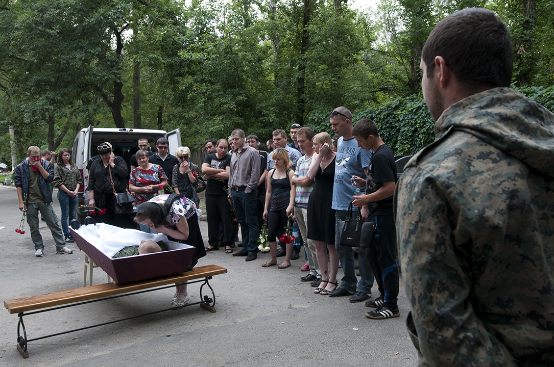 Family members and freinds paying their respect to the deceased.