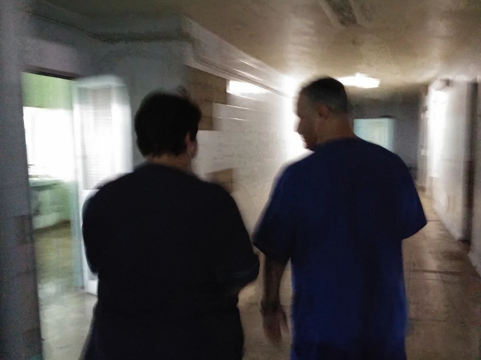 Doctor and the Nurse walking to the operation room.