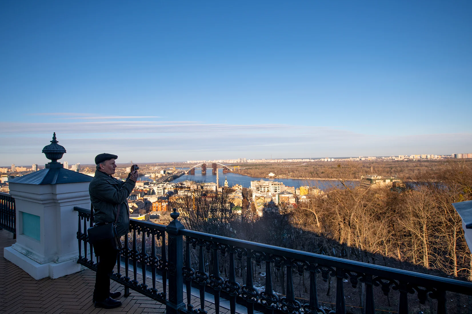 A man taking pictures from St. Andrew's Church
