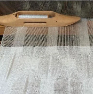Art Sparks: Weaving Warp Ondule: A Method for Managing the Fan Reed