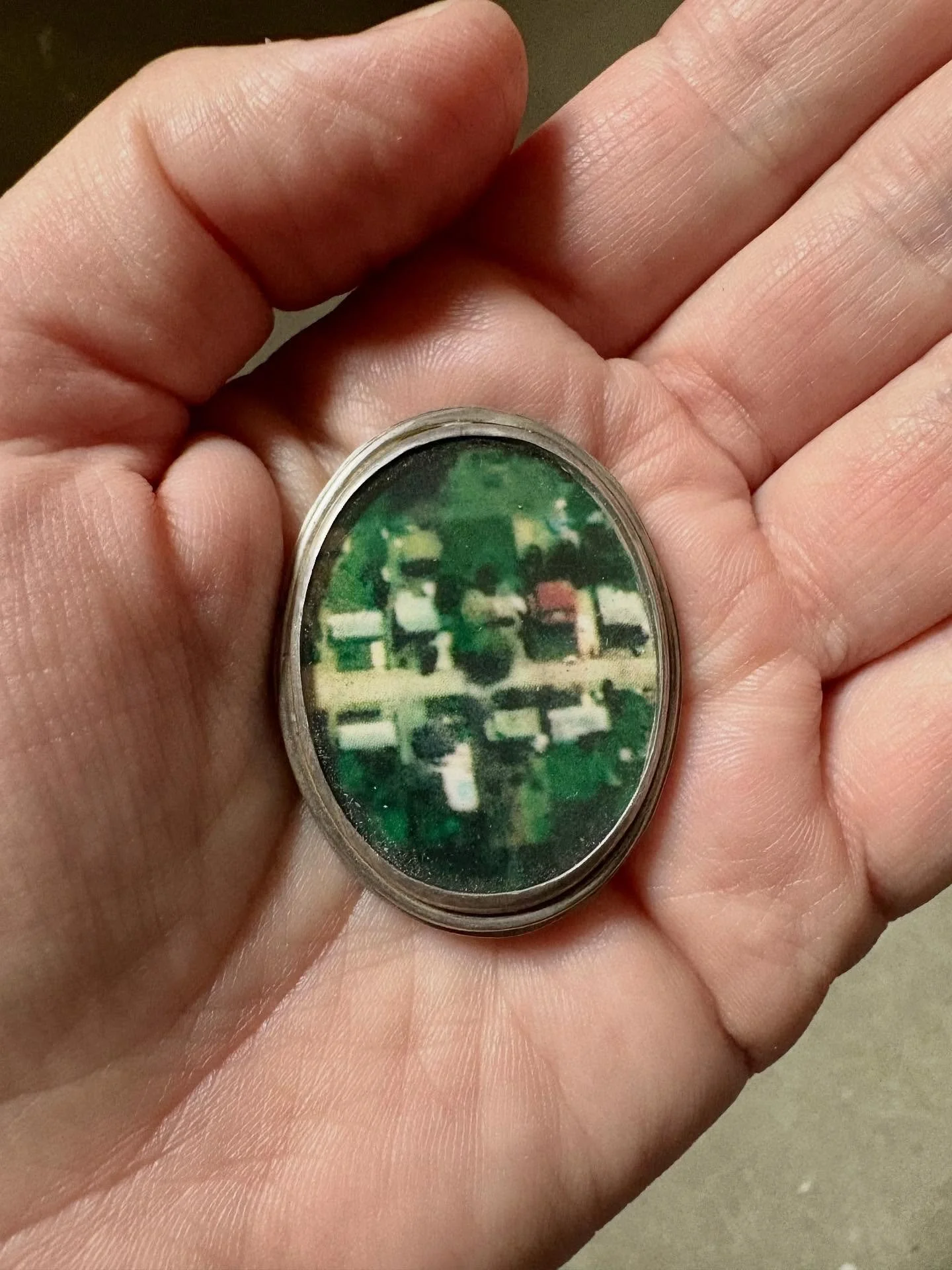 Airplane window brooches from 2006. Eye glass lenses set over photographs backed in mica, in sterling silver. Not much has changed the way I view things from above and below. What you see depends on where you stand.