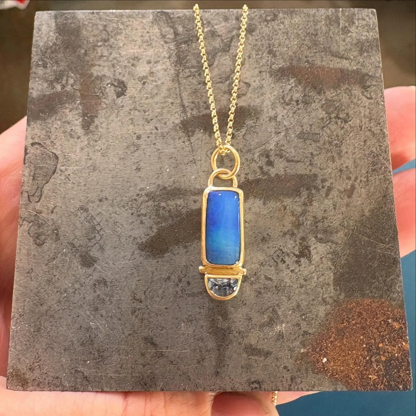Utilizing these beautiful half moon Montana sapphires from @columbiagemhouse - offered a way for me to ride the metaphor for my Seascapes. Little boats, life rafts. What you see depends on where you stand, in 18ky - Australian boulder opal from @brok
