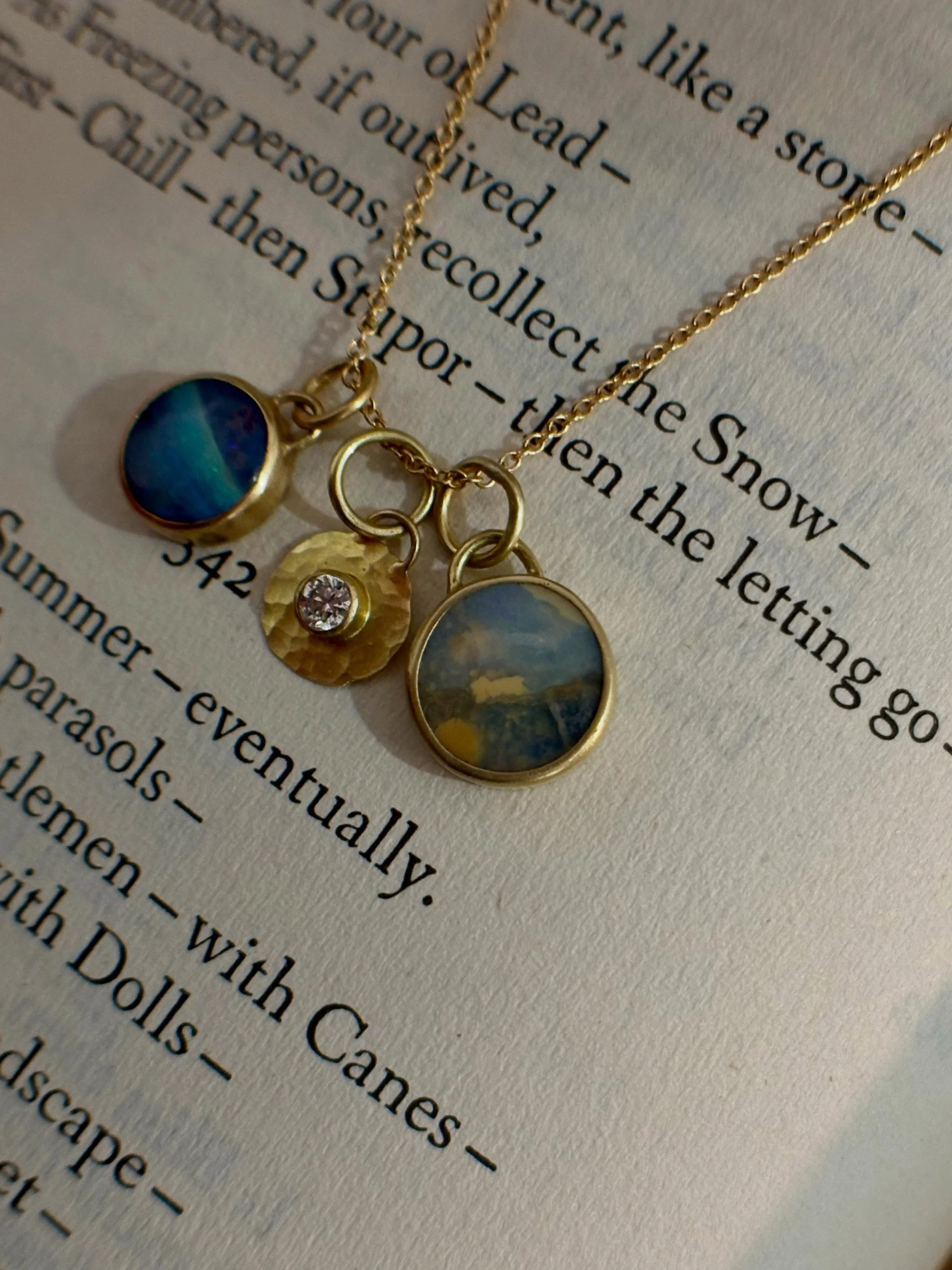 Another opal in homage to Sir Franklin&rsquo;s ill fated 1845 expedition to the Arctic. Poems by Emily Dickinson. 

The orange, yellow and white in the opal is referred to as potch, uncolored opal. Not every opal blazes with rainbow color. Some carry