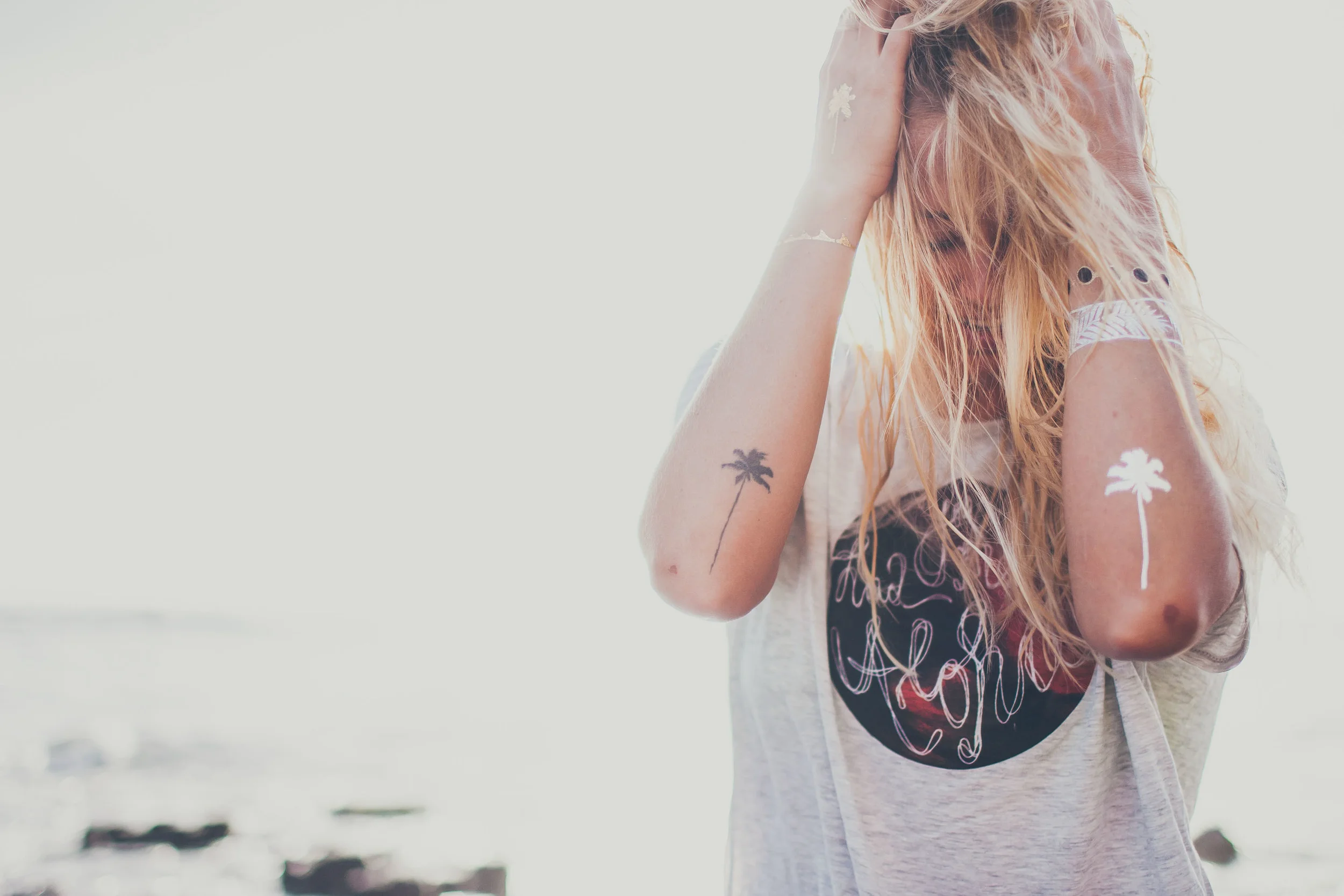 Rebekah in our You had me at Aloha tee with some awesome Flash Tatts