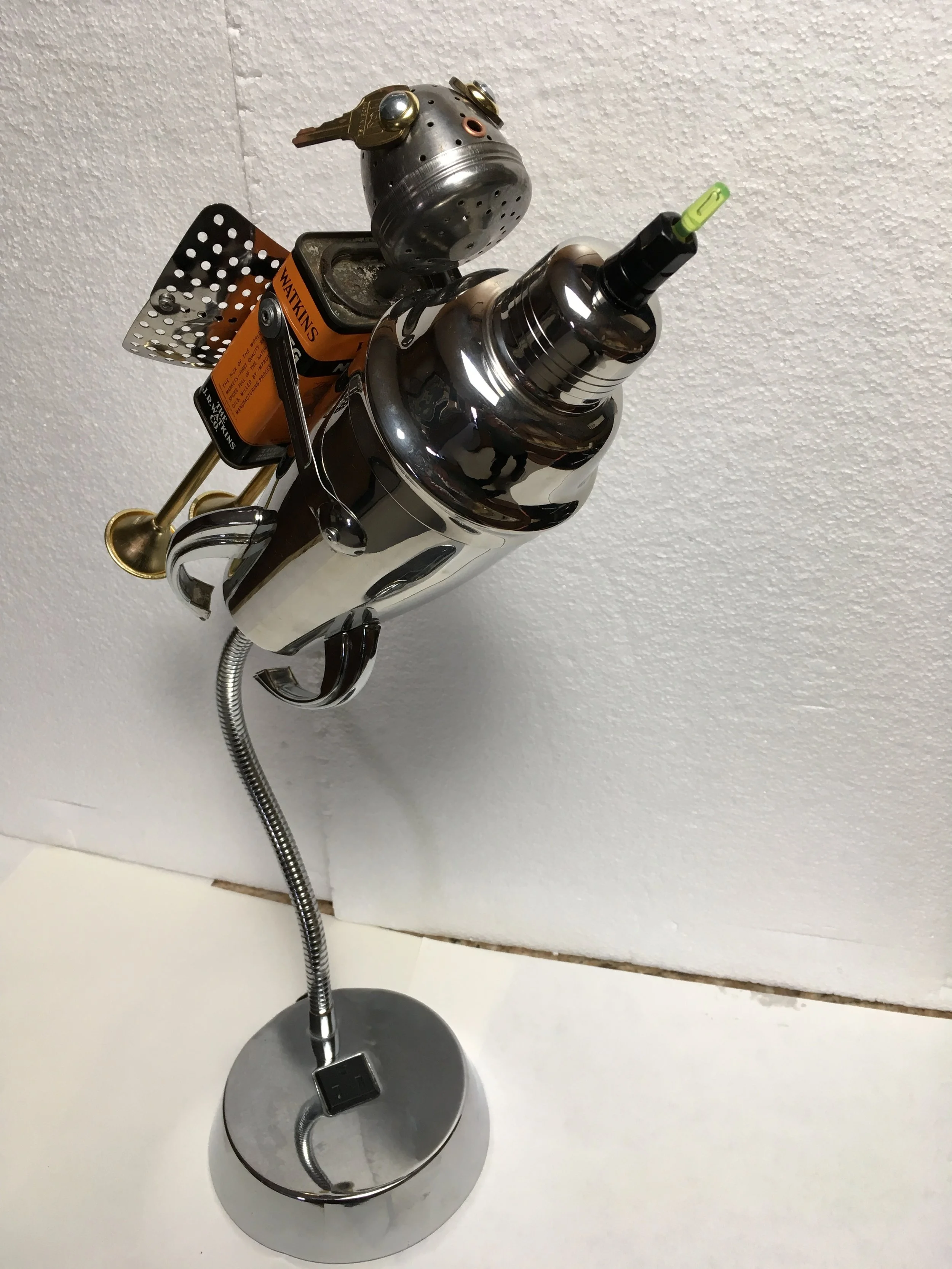 "Robbie Robot on a rocket"