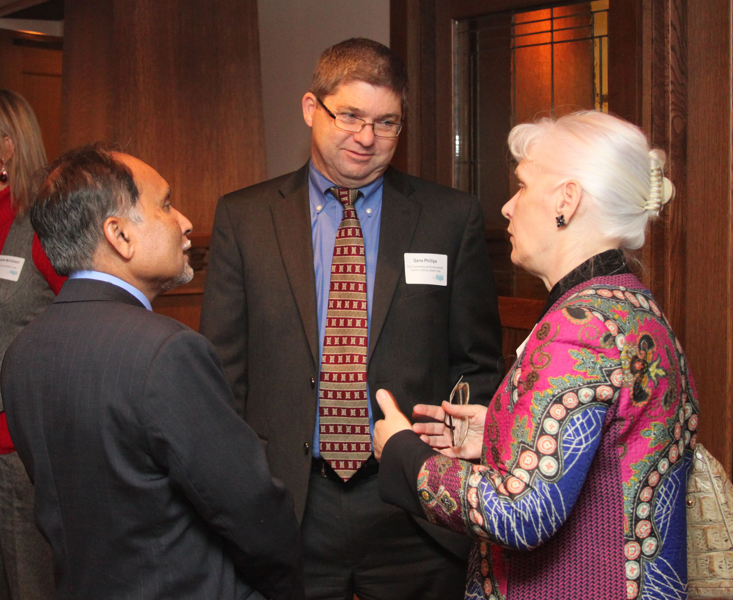 Dr. Zaman and Gene Phillips, Civil engineering alumnus, welcome OU Provost Nancy Mergler.