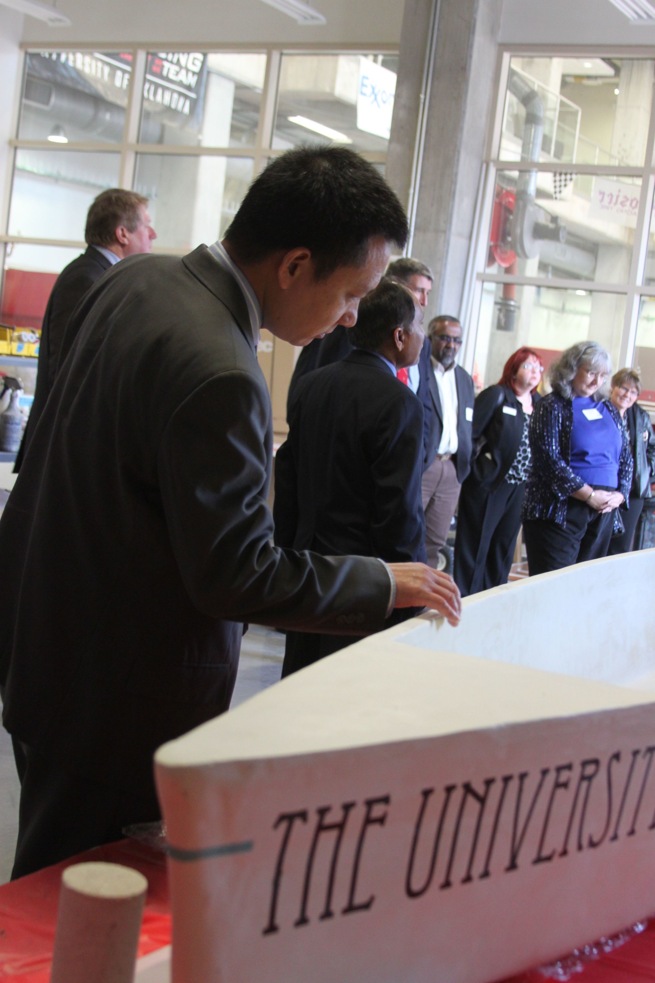 Guests admire the Concrete Canoe bay in the REPF.