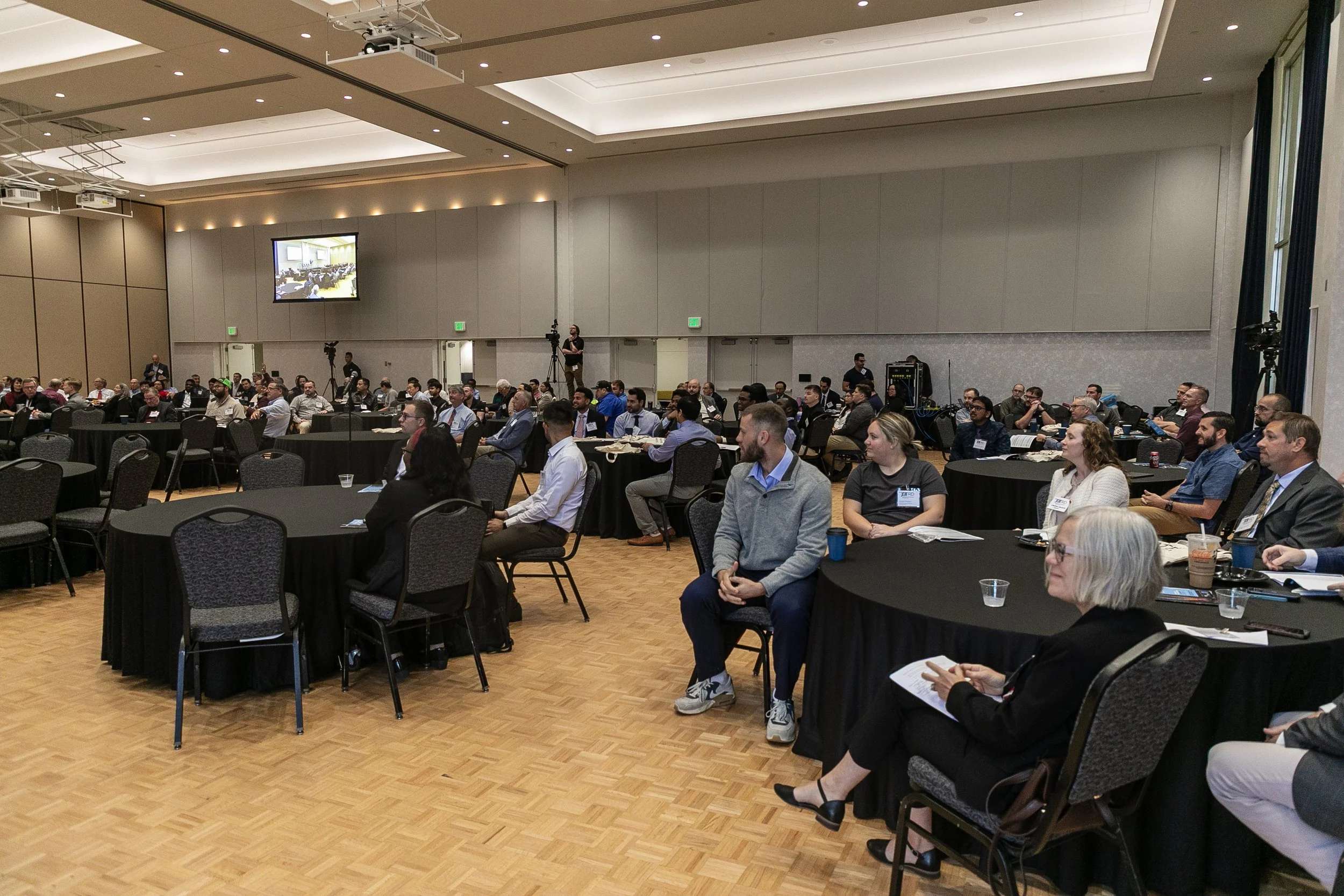 Audience listening to a presentation