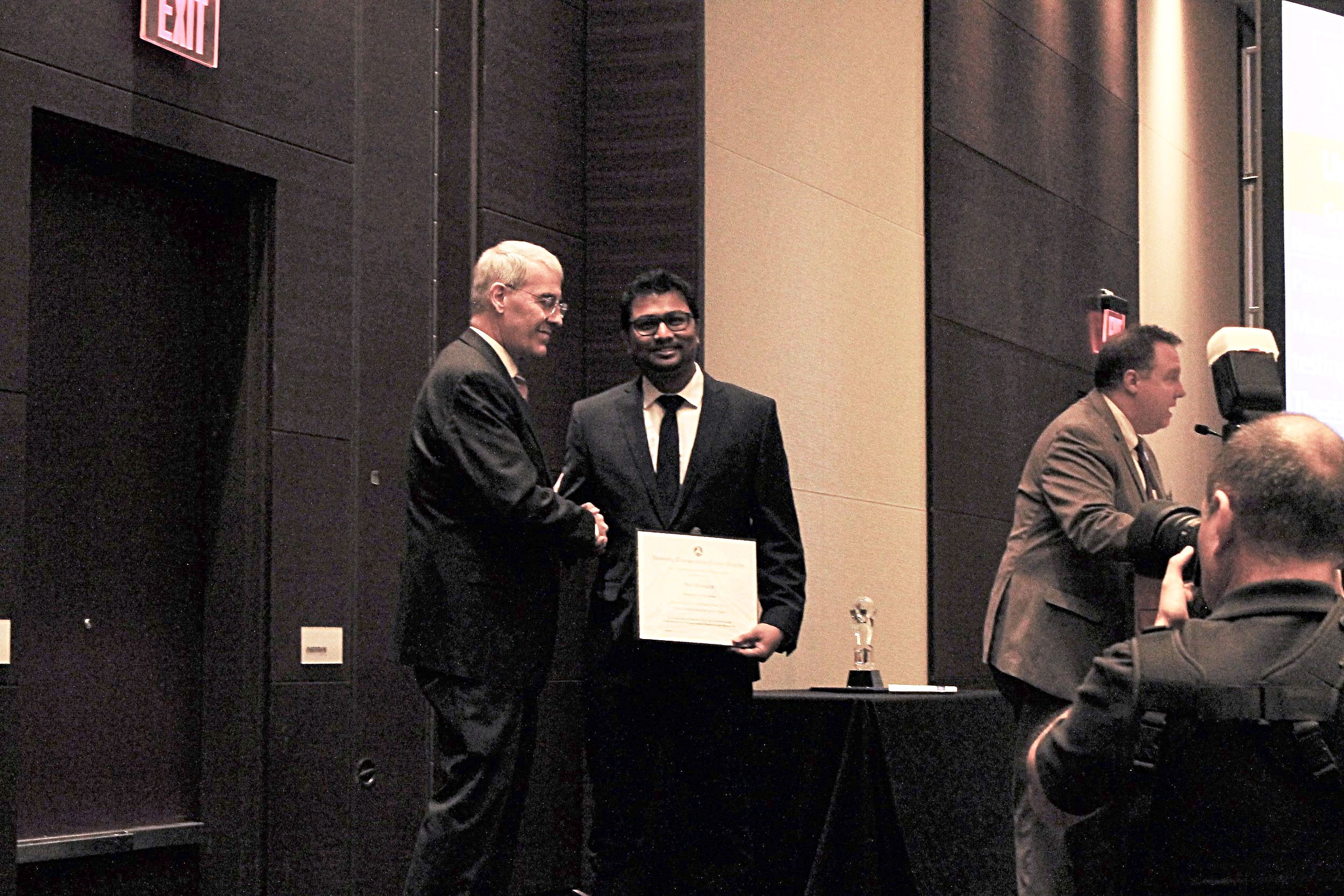   Nur Hossain (OU), SPTC’s 2018 Student of the Year, receives his award at the Council for University Transportation Center’s Annual Banquet in Washington DC, January 6, 2018.&nbsp;  