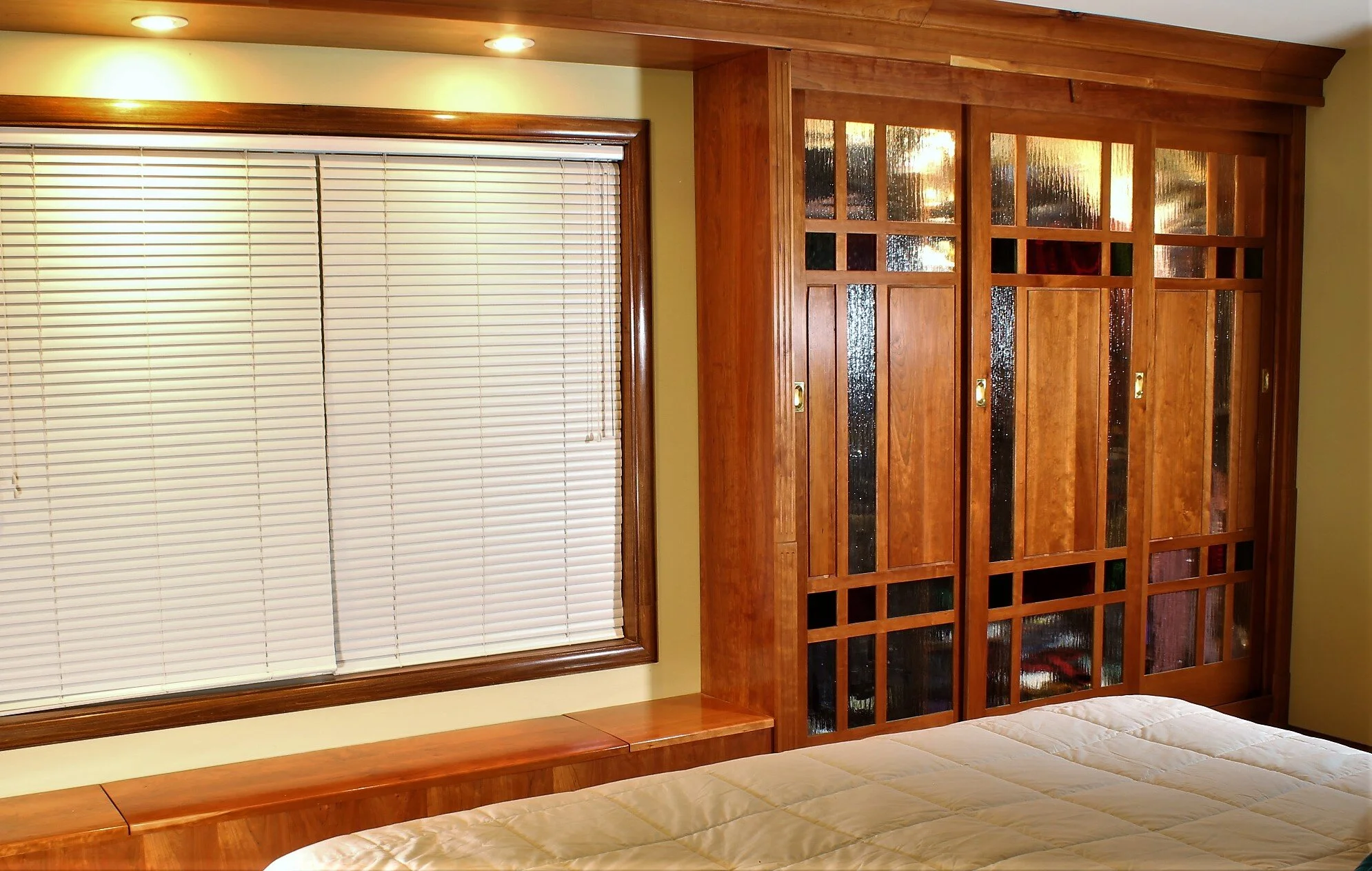Three sliding door garment closet