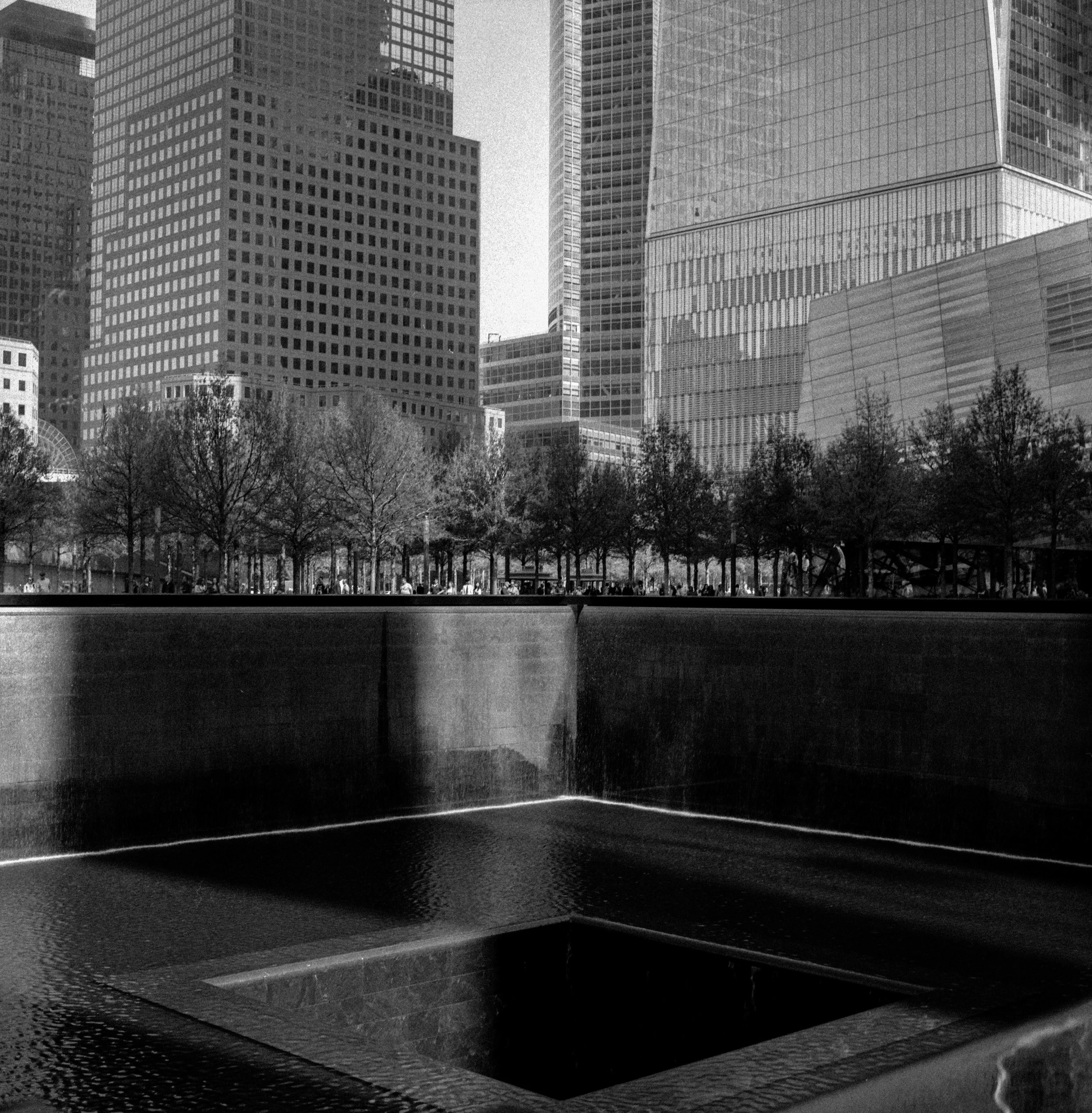 The Very Moving 9/11 Memorial in New York City. Note the grain in the sky.