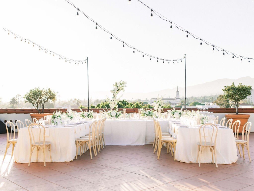 Santa Barbara city and mountain views set the backdrop for Alex &amp; Zack&rsquo;s intimate @canaryhotel wedding. We brought in all the ivory and white tones from @theonicollection and @latavolalinen to soften the space for their dinner celebration. 