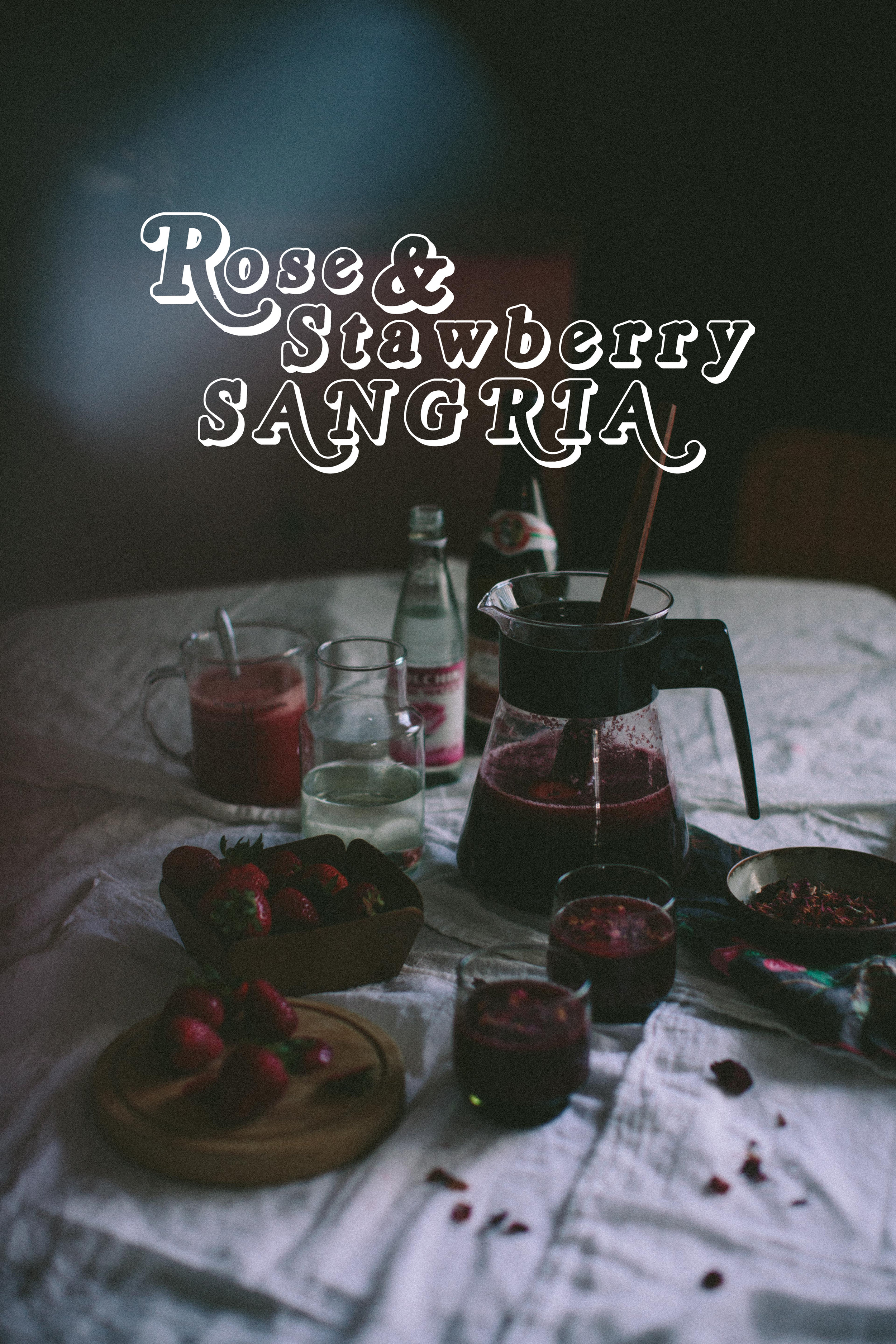 What is better in summer than Sangria? I'm always looking for ways to mix it up and create new inventive drinks. Sangria being one of my classic - easy , go -to drinks, I tend to make it often. Especially when a group is involved. This time, I wanted to combine sangria, with two of my favorite components-- strawberry and rose. If you have been following us, you know that whenever there is an opportunity to use rose, I usually will take it and this is one of those moments. For this recipe, I decided to use a base of a sparkling red wine, otherwise known as Lambrusco. It is a great base for a sangria as it is usually light, slightly sweet and sparkling. Sangria doesn't always have a sparkle, but I prefer it to be a bit bubbly, as I do with most drinks. So for this recipe, try using a Sparkling Lambrusco, but if your local shop doesn't carry it, a simple table wine or sweet red wine will also work. I also use a Rose Simple Syrup in this recipe, which you can find the recipe for here. With any punch or sangria- I always recommend letting it marinate in the fridge in a closed container for at least 20-30 minutes to help the flavor develop.