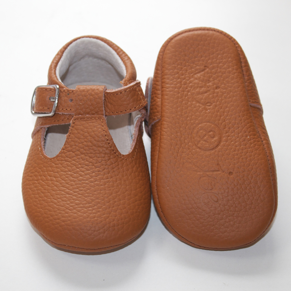 tan baby shoes