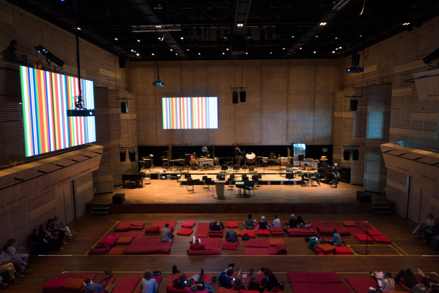   Rem Koolhaas's barcode EU flag decorates the inside the Muziekgebouw's main hall during Urbo Kune.&nbsp;  Photo by Canan Marasligil  