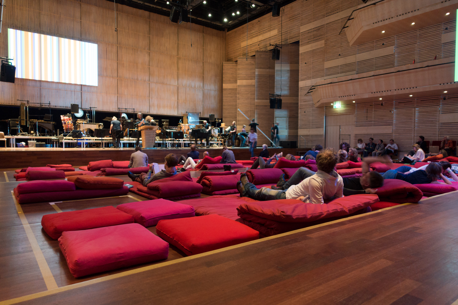    Cosy futons replace concert hall seats: the atmosphere is relaxed inside the Muziekgebouw's main hall&nbsp;   during Urbo Kune.&nbsp;Photo by Canan Marasligil  