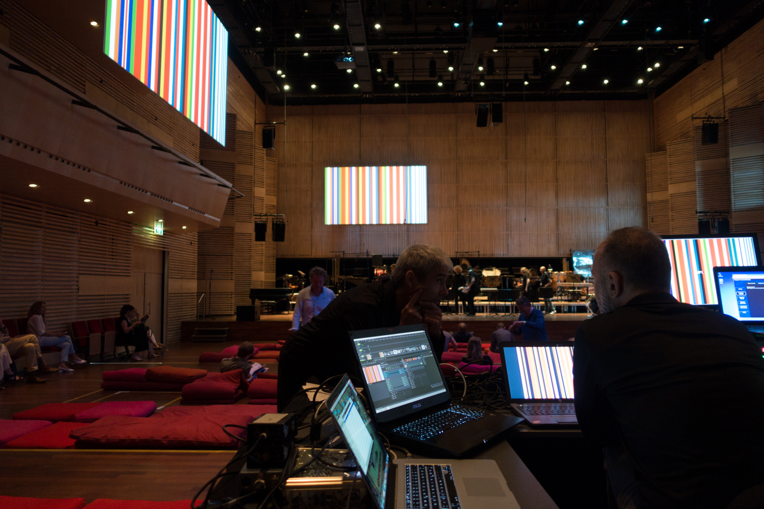    Rem Koolhaas's barcode EU flag decorates the inside the Muziekgebouw's main hall during Urbo Kune.&nbsp;   Photo by Canan Marasligil  