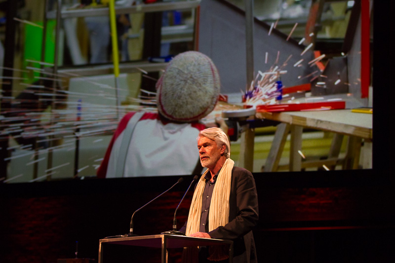 Jury Member Chris Dercon reads the Jury Report at the Ceremony. Photo by Xander Remk es