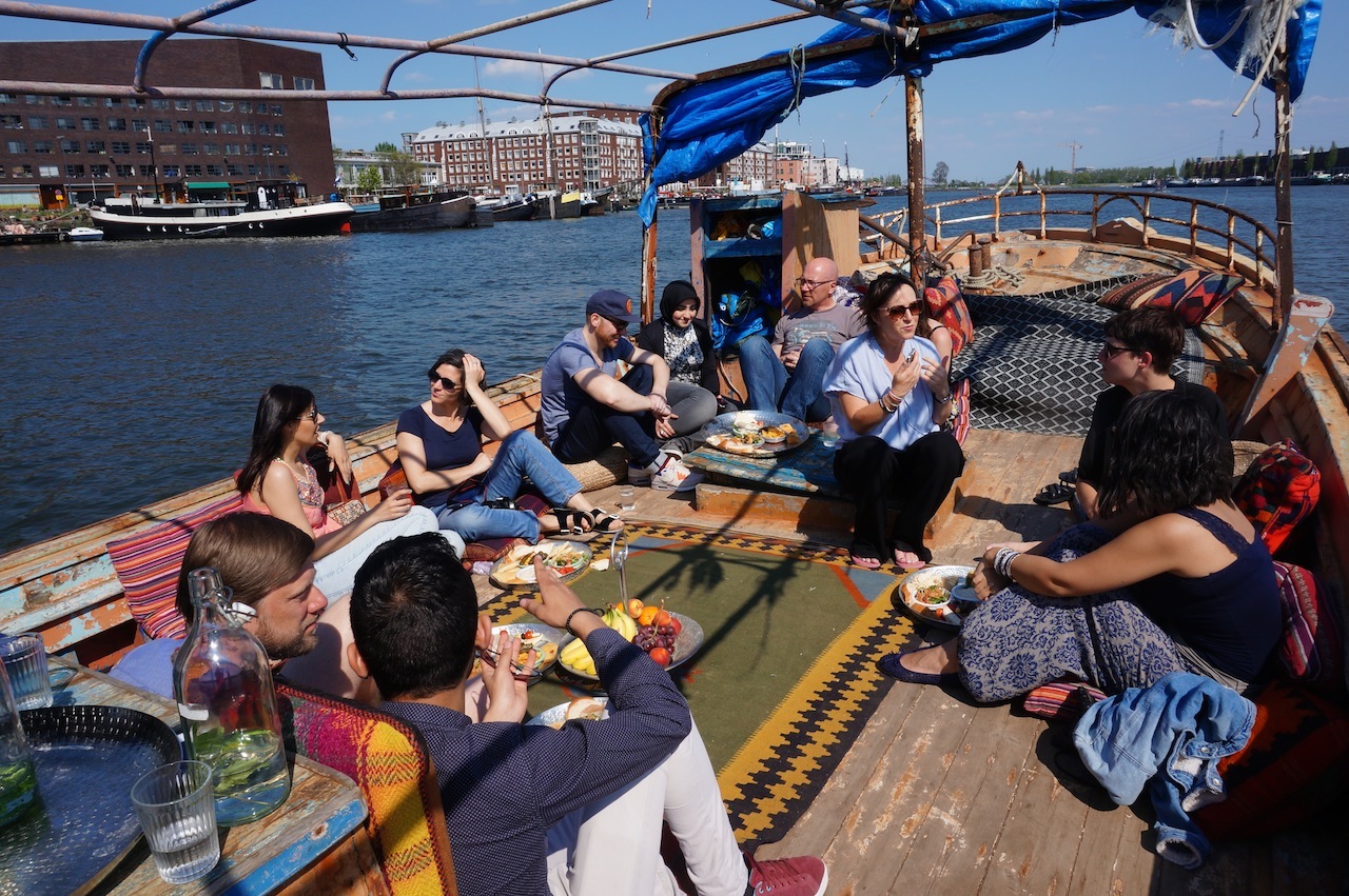 The Living Room took place on a boat in Amsterdam in April and May 2016. Photo via Migrationlab.org .
