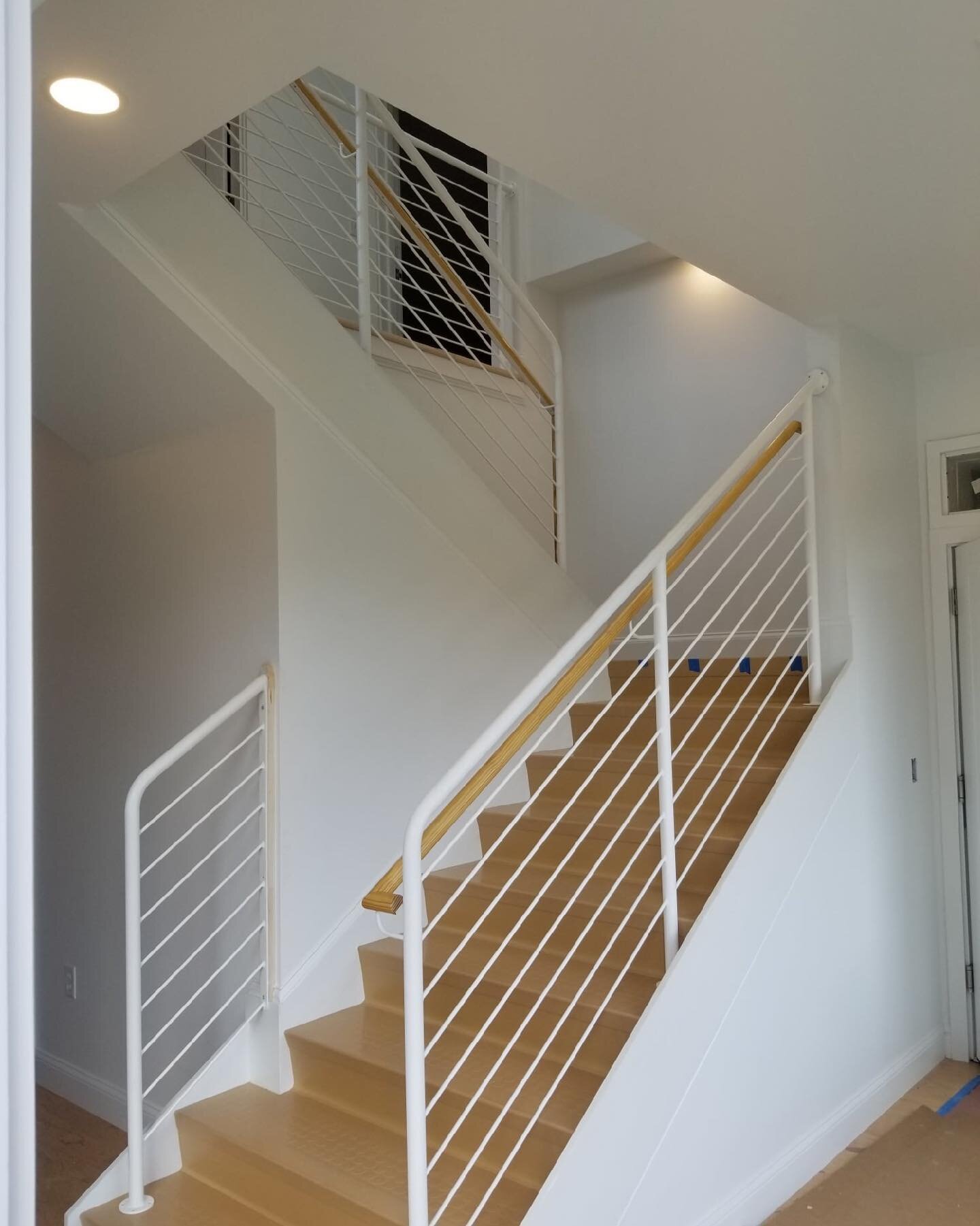 White powder coated railings with wood handrails. Alfred ME