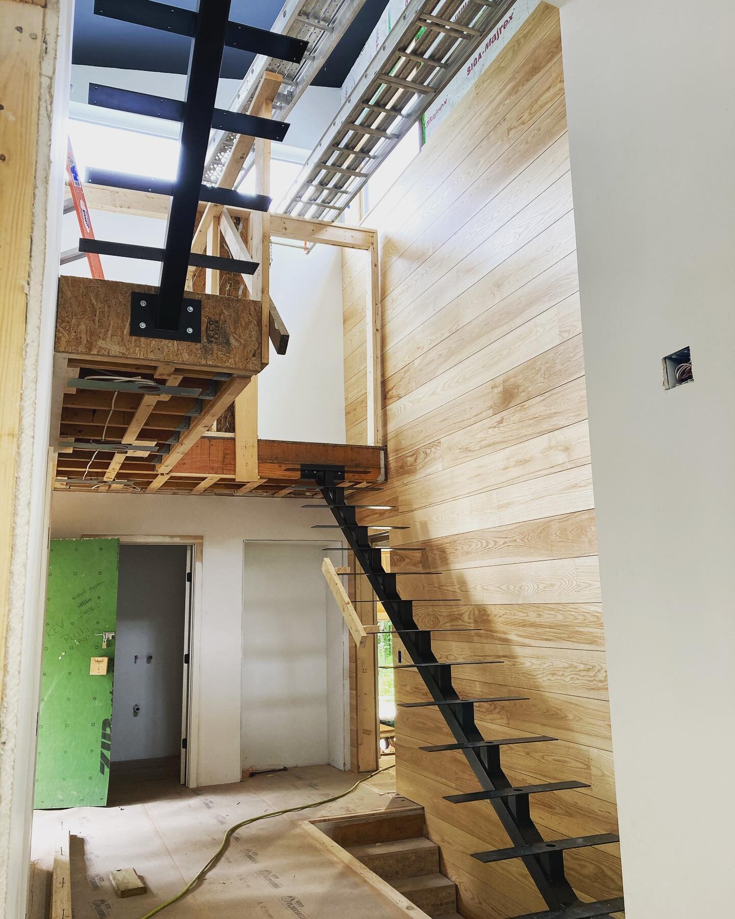 Stair skeleton installed in yarmouth today. Designed by BriBurn Architecture and contracted by Sylvain and Sevigny Builders. Next up, 4” thick wood treads and blackened steel rod and flat bar handrail. @briburn_architecture @sylvainsevigny