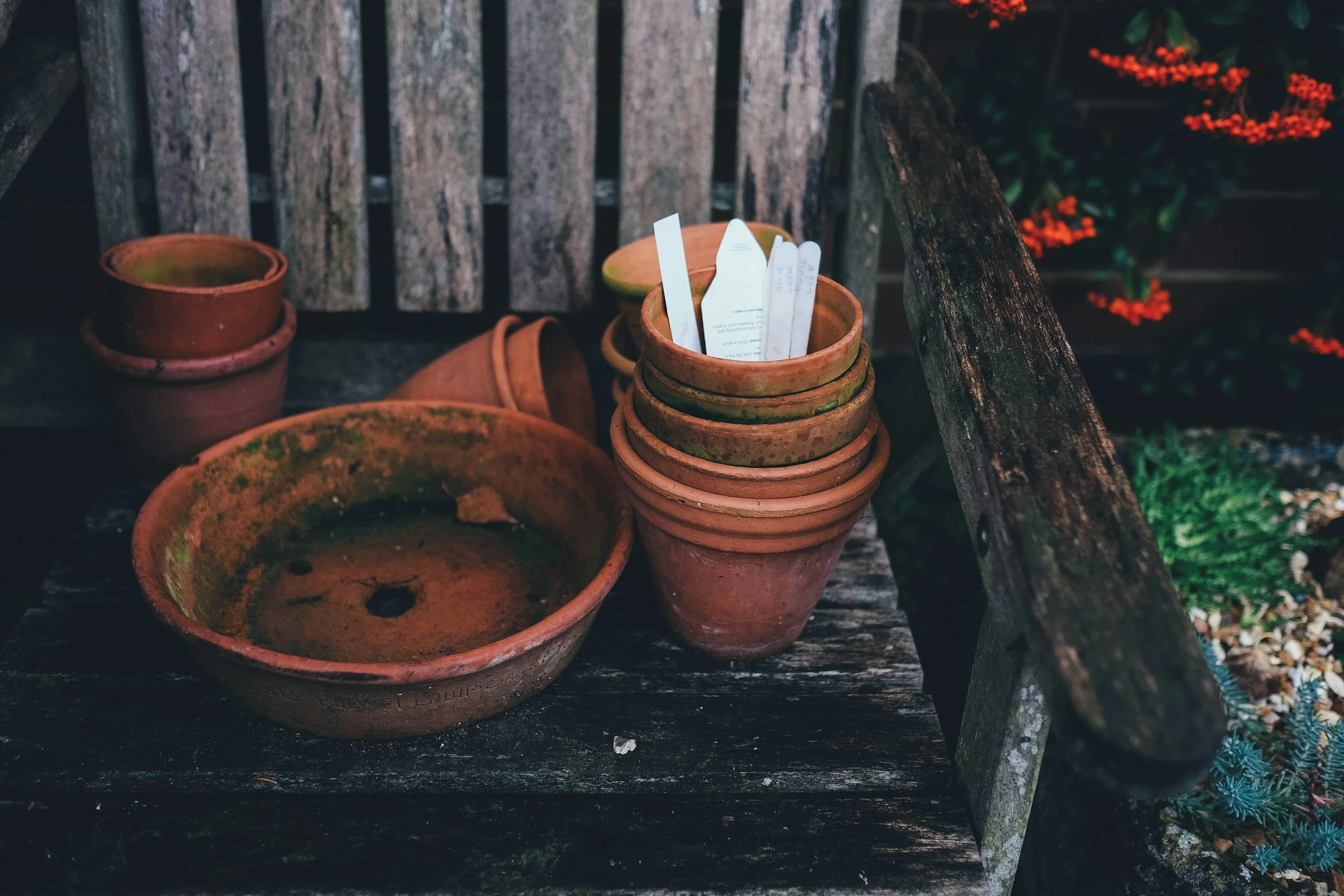 a stack of clay plant pots and base