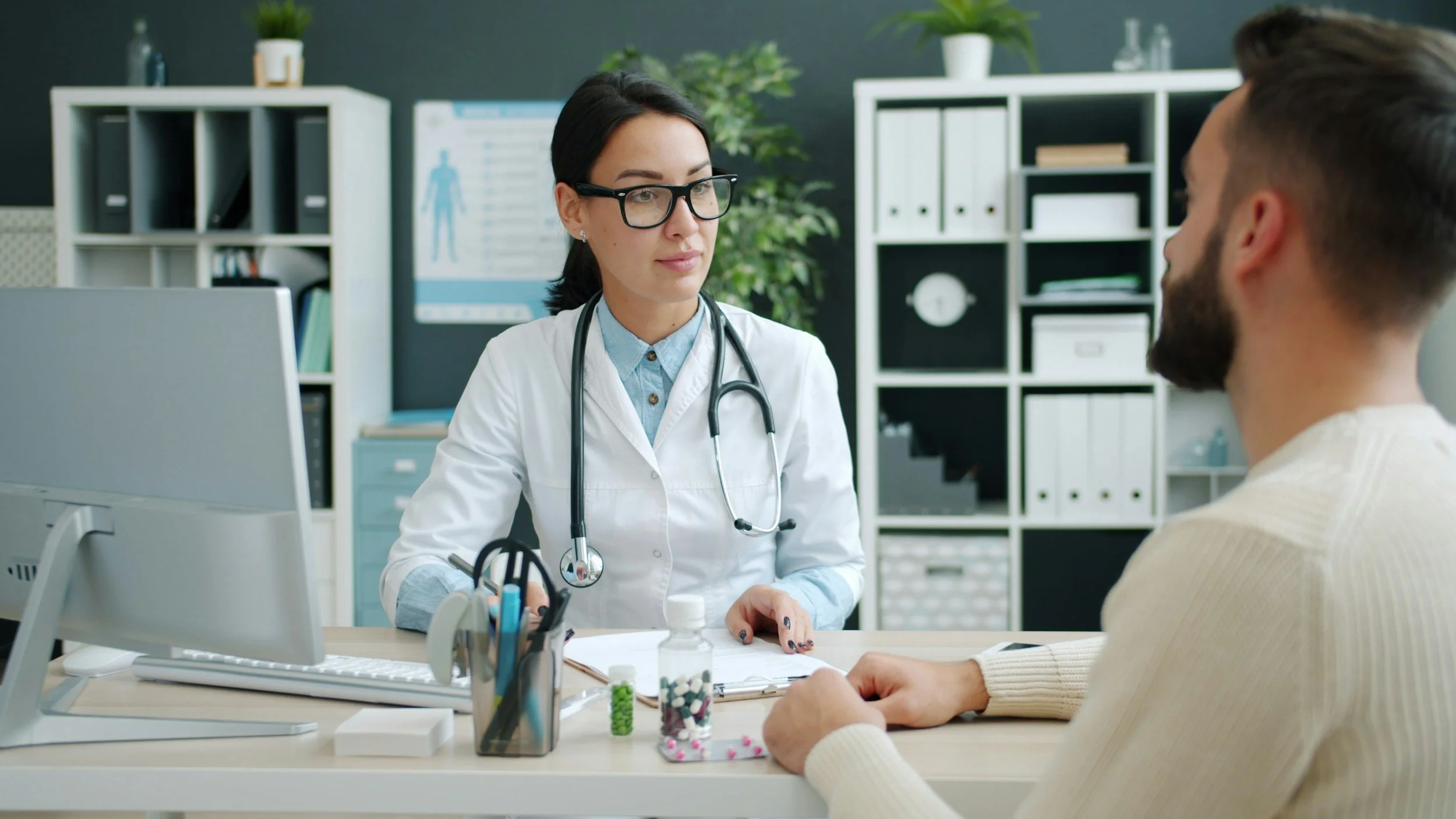 doctor consulting with a patient in an office