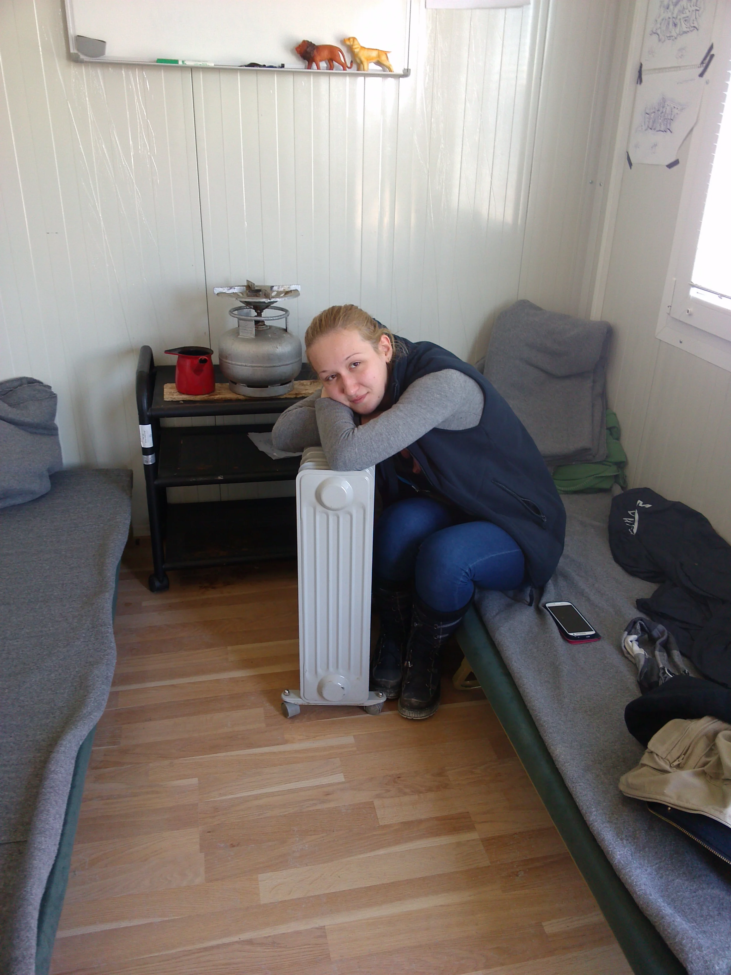 A colleague getting warm in our non-smoking cabin the previous day.