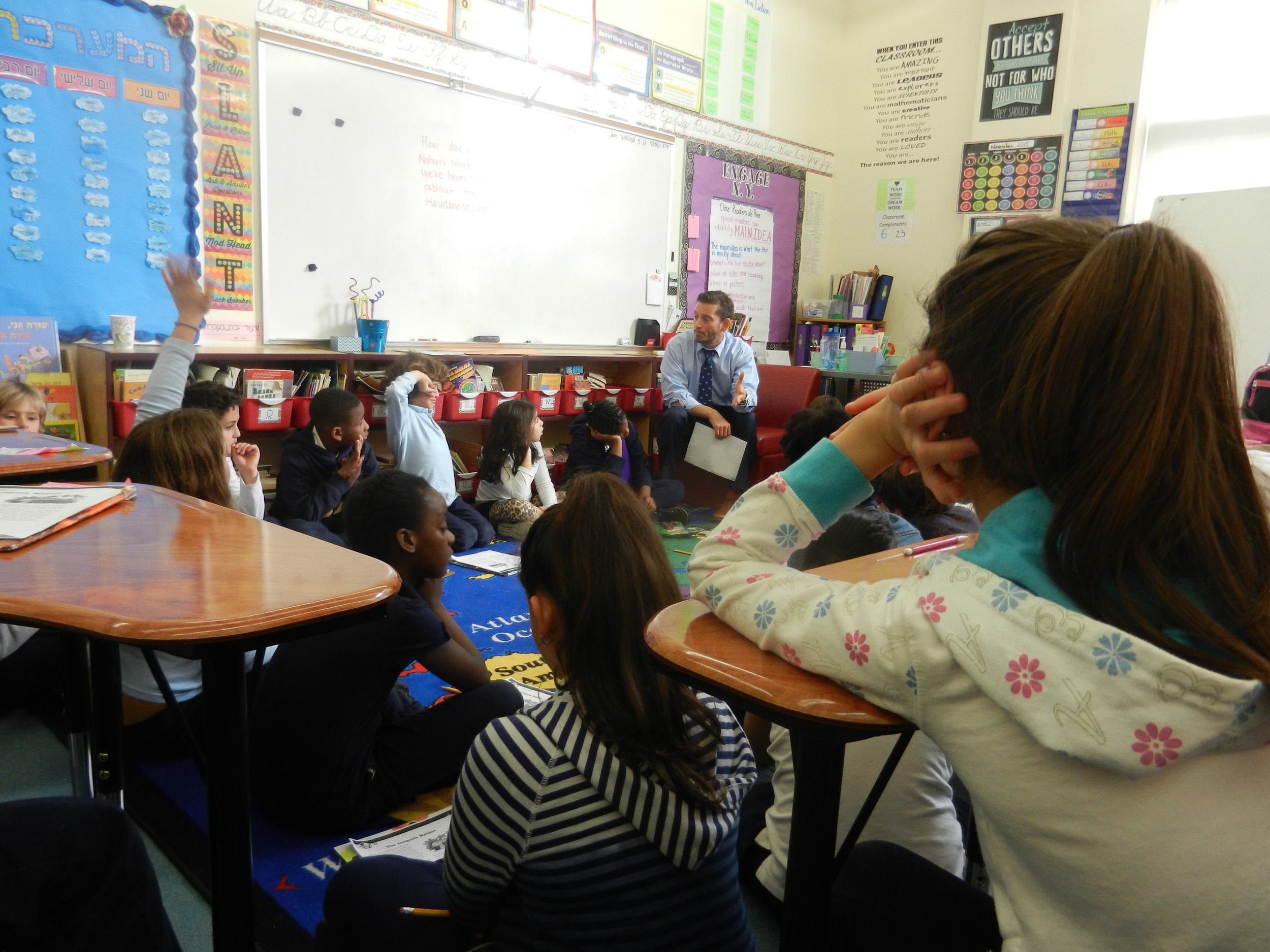 Teachers in APOQ workshop doing a lesson-plan. 2016.