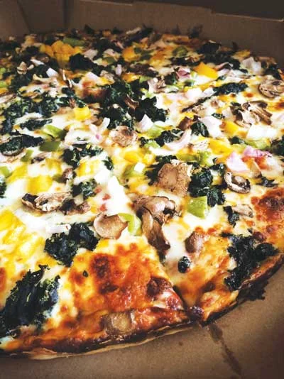 Signature GF Spinach Pizza at Stadium Market (photo by Brandi Lyons)