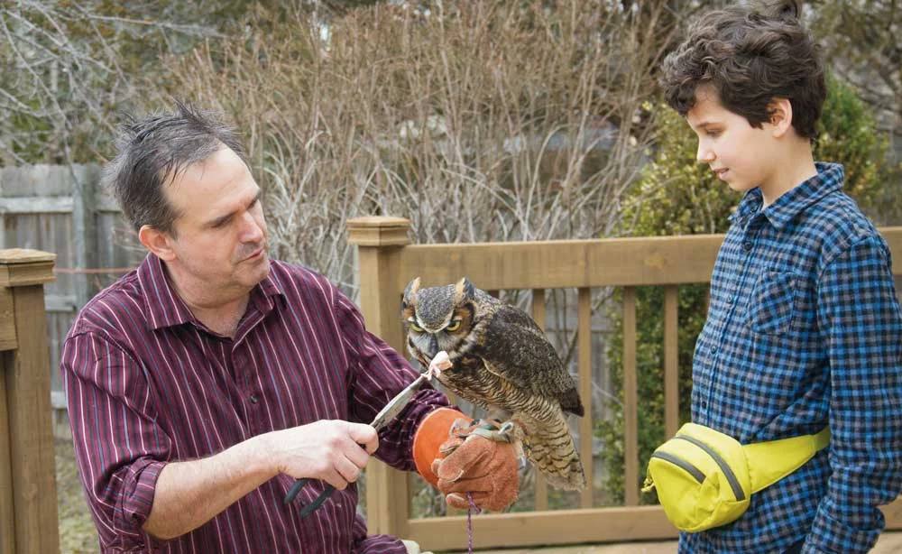 Master Falconer Craig Perdue, Elijah Hatcher-Kay and Rupert the owl