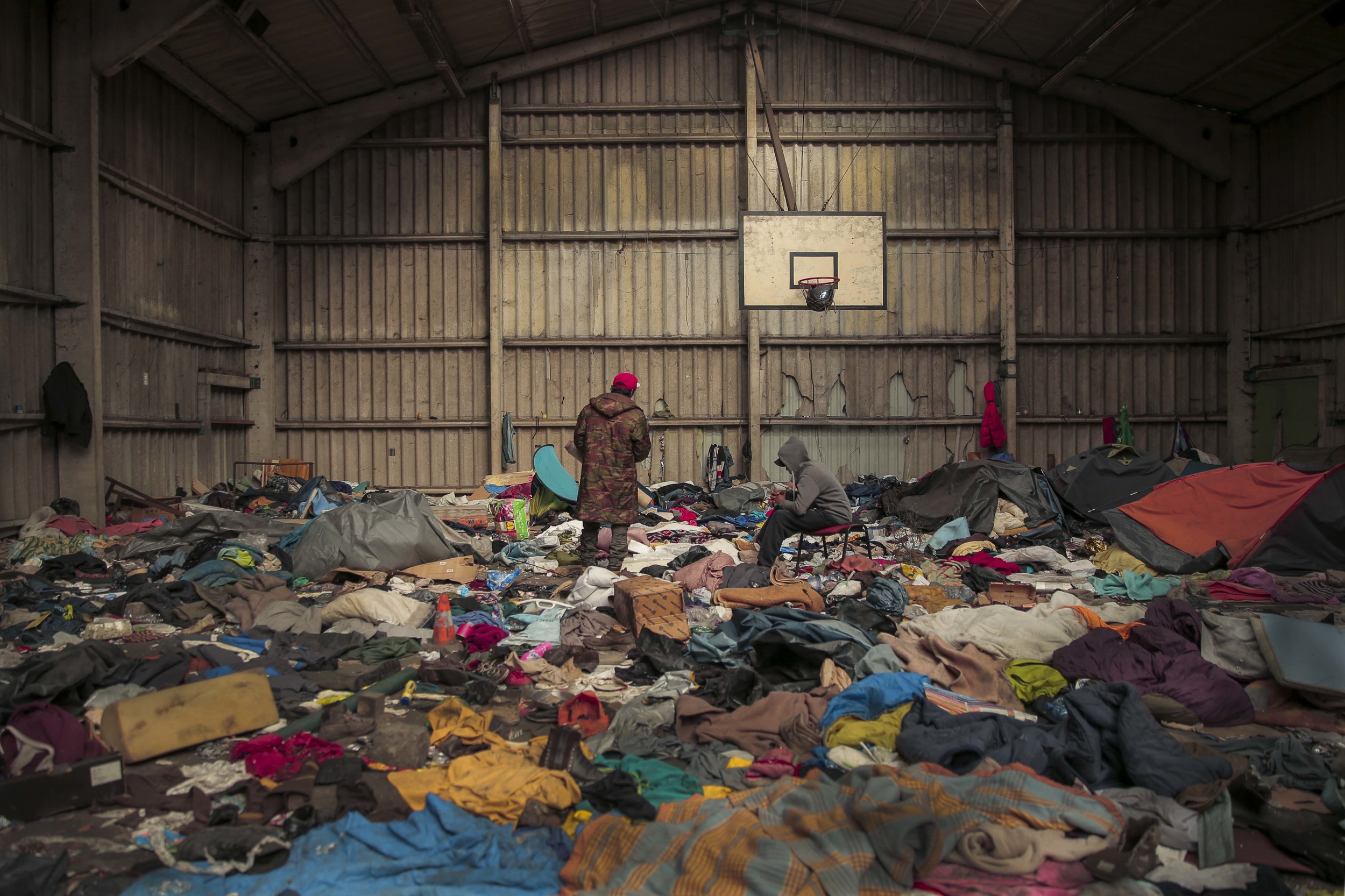 Jamal 16 and Rasheed 17 come back to the sports hall to look for lost items