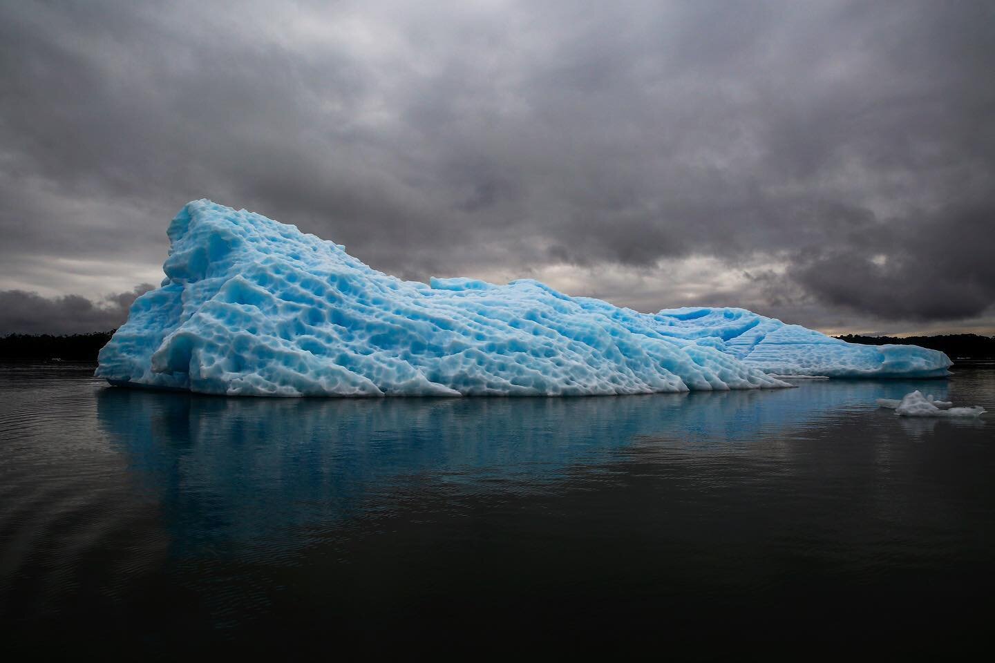 There is something very special about glacial ice. These incredible icebergs were scattered throughout the lake surrounding the glacier like huge blue hulking works of art emerging from the water. I particularly loved this iceberg. The texture was in