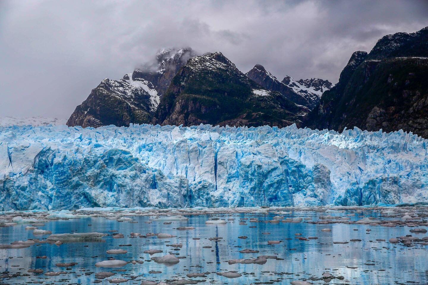 In order to get to the remote San Raphael glacier we took a small boat, but we couldn&rsquo;t get too close because huge pieces of ice the size of apartment blocks calve off the glacier regularly. The immensity of the glacier hit me; a giant blue wal