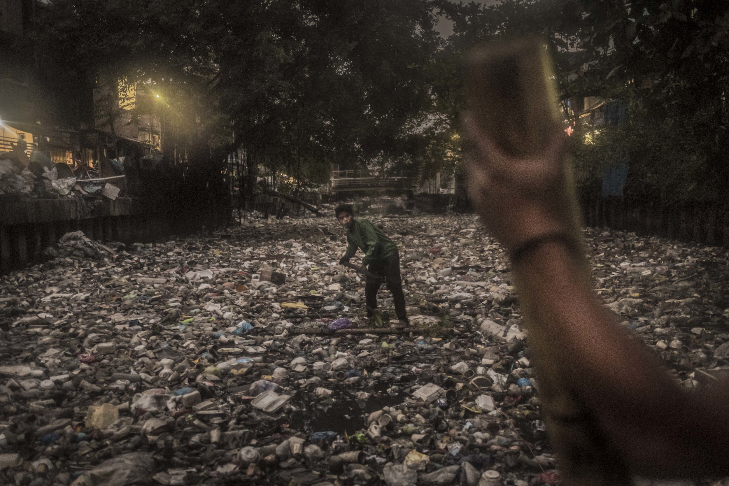  A PRRC river warrior cleaning up the Pasig River in Manila, Philippines 