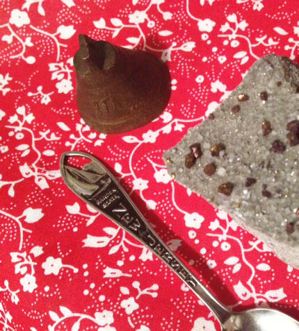 Vintage bell with a nice chime, New Jersey souvenir spoon, and a crazy gemstone that is much more sparkly in person.