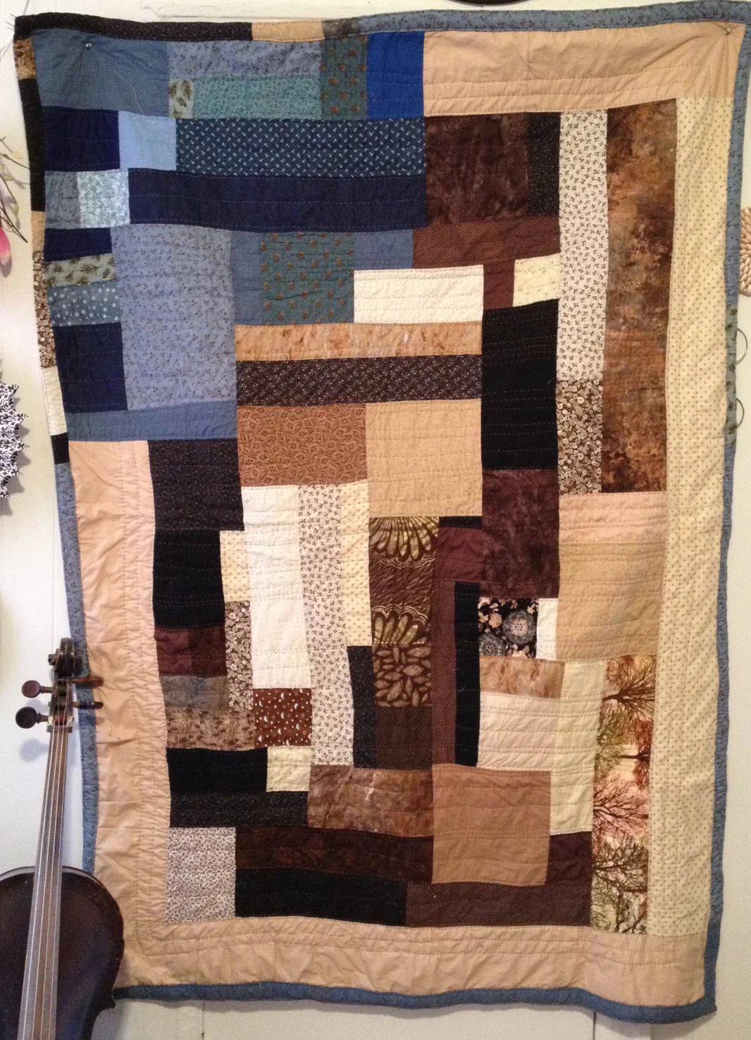 I really thought this quilt was going to be a regular rectangle. But they always somehow get out of control and go all wonky. That's what I get for not measuing. And I wouldn't have it any other way!