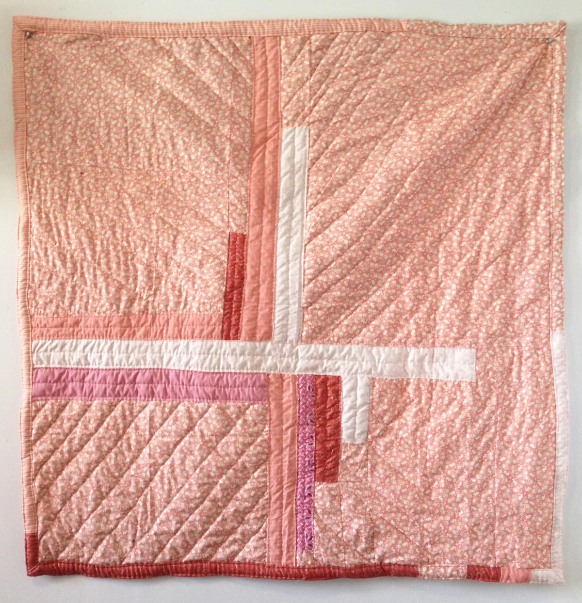 I still haven't figured out the best way to photograph quilts in my house. This works for now... At least you get the idea!