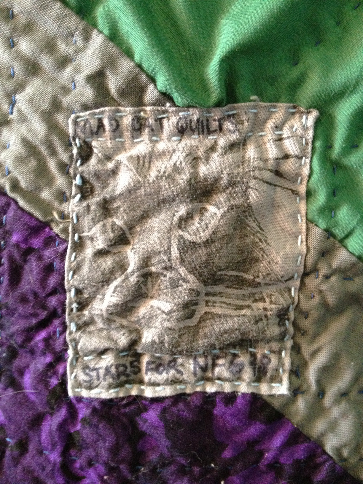 It was hard to get the detail of the patch label. I pre washed the label and it faded a bit, but I like the results. 