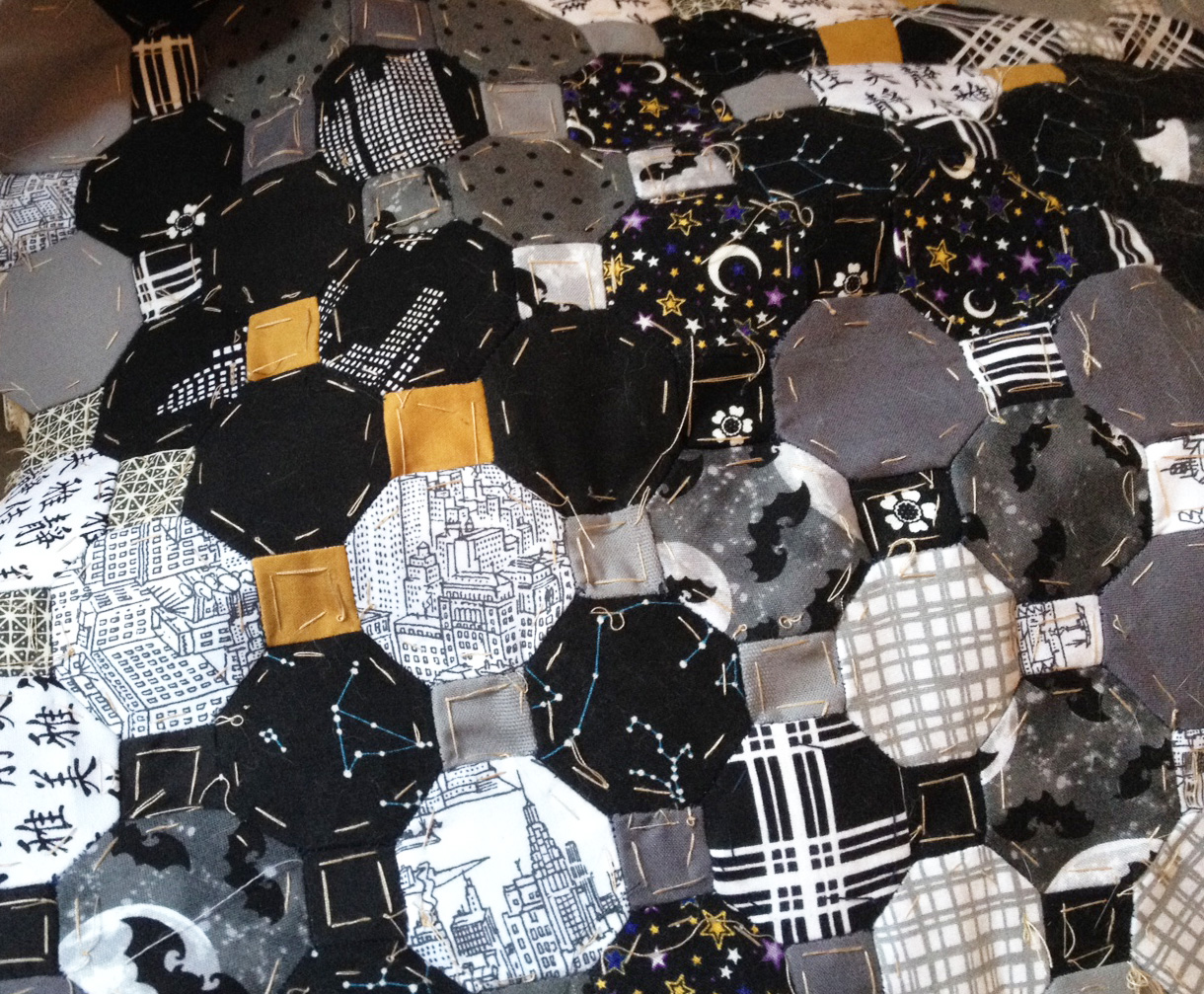 A lot of octis and squares sewn together. 