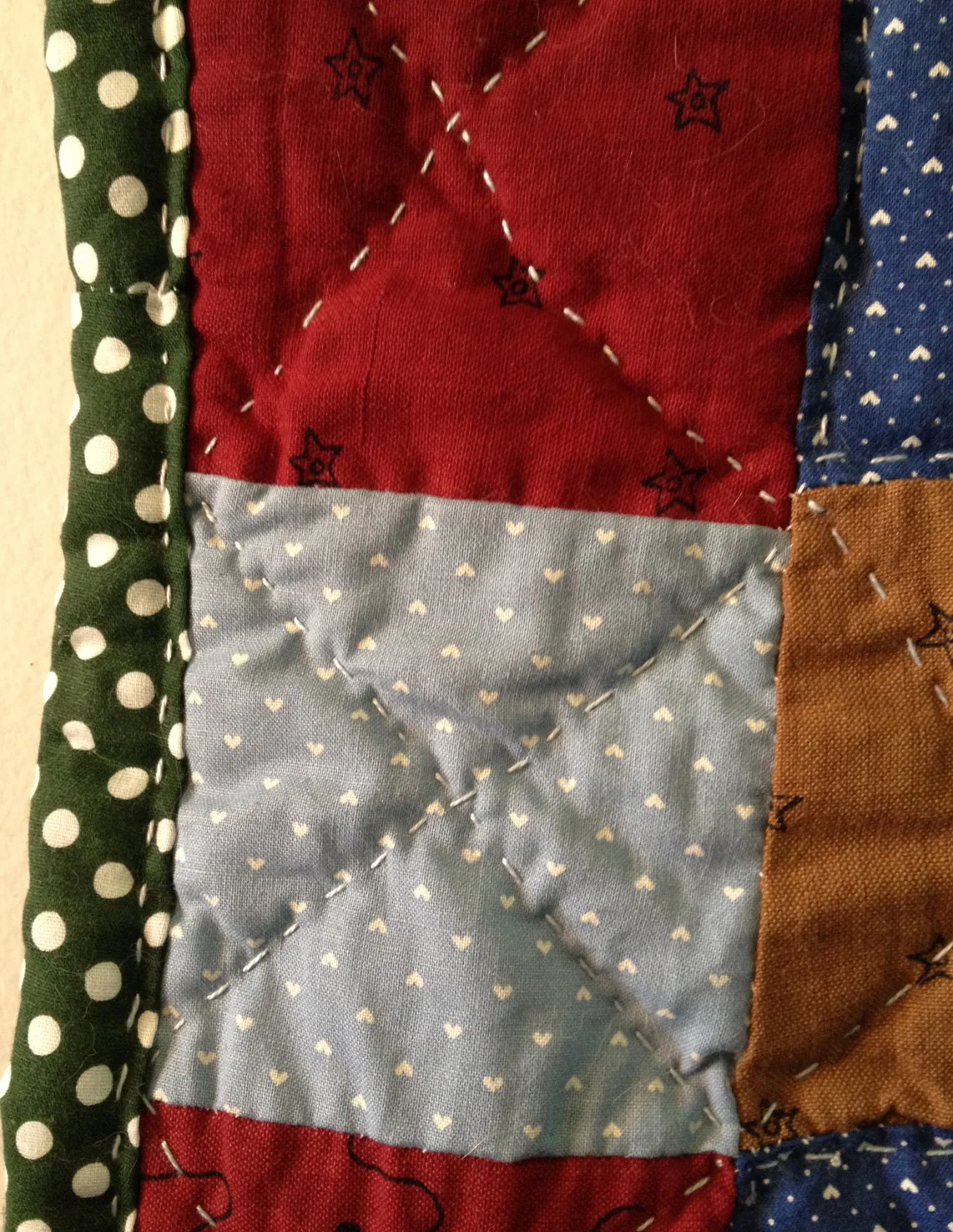 I tried to keep this quilt relatively free of cat hair, but that never really works out. Several of the cats helped me with this quilt, but surprisingly there wasn't a stand out helper. 