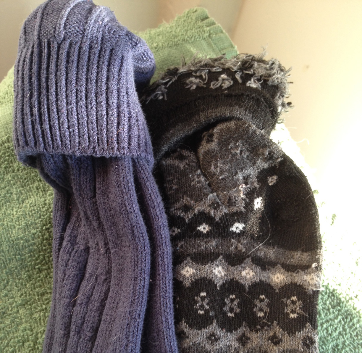 Warm winter socks to get packed away. Including the cat hair. 