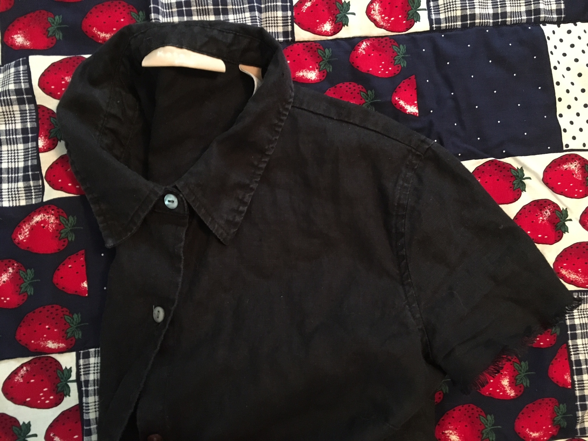 I recently bought this shirt at goodwill. It had lace on the sleeves, which I thought I liked, but ended up hating. I cut it off and the rough edge is way more my style. 