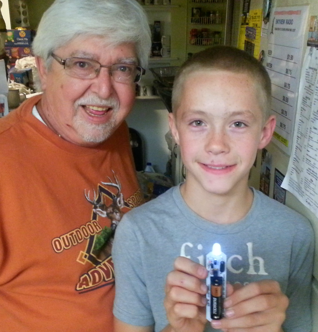 Jack, KA3HPM, and Joe, KC3CSI, proudly smile and show off Joe’s completed HumanaLight project. (Photo Credit: John Hoffman, K3STL)