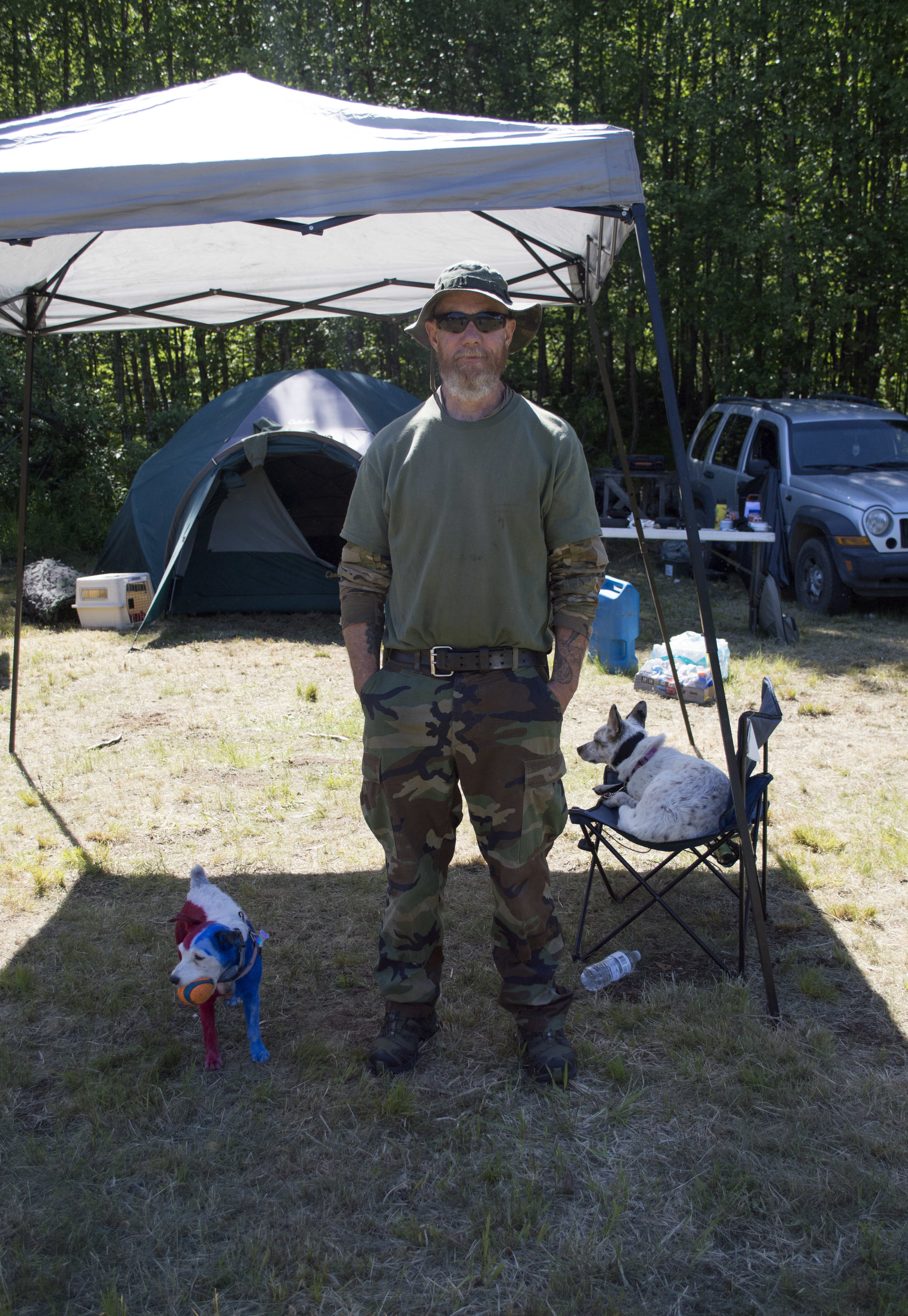 South Central Patriots founder John Root III and his dog PeeWee.