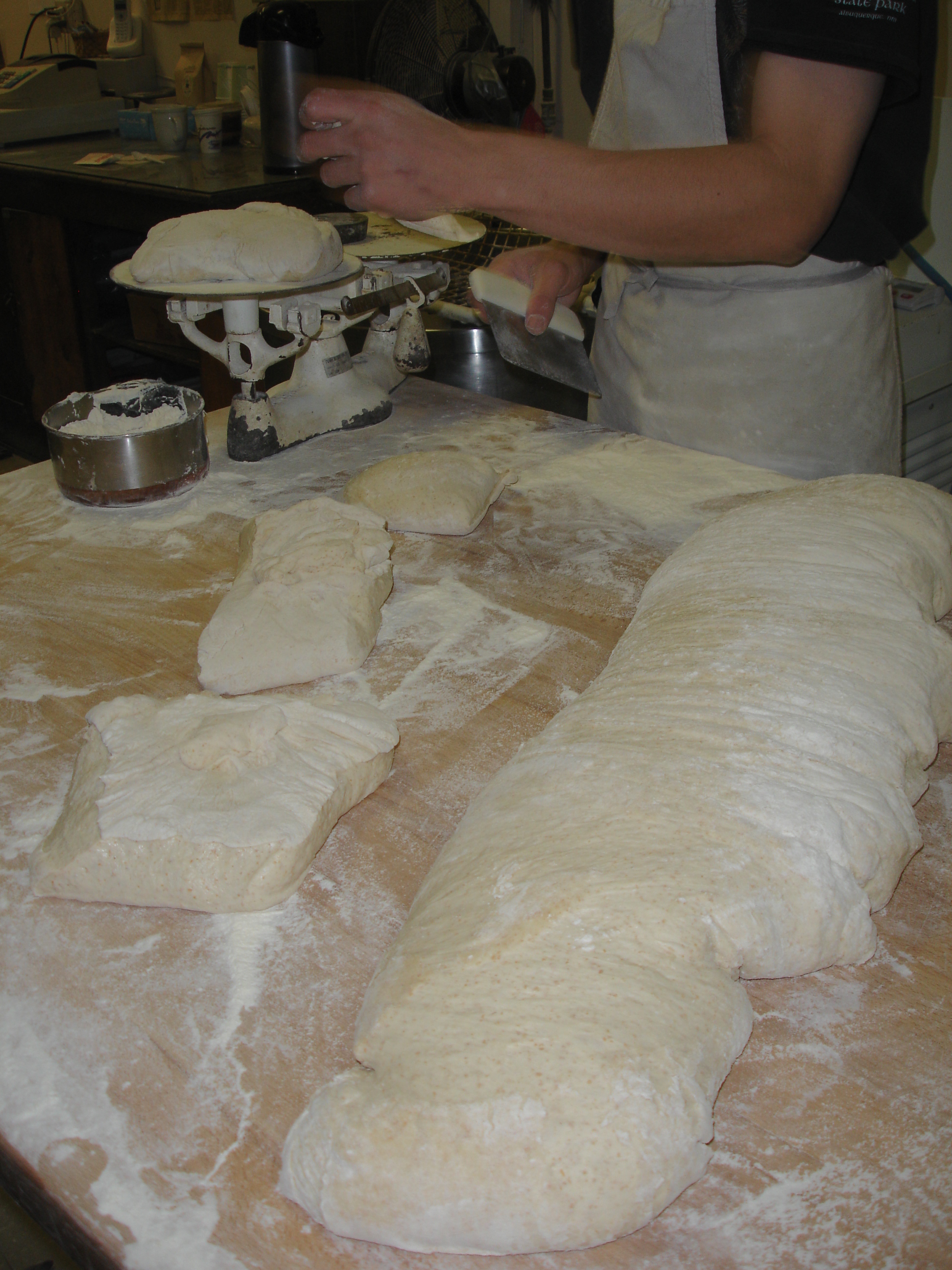 Dough being weighed
